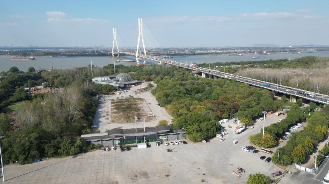 “公园”成“私园”背后:委托管护解除后,南京二桥公园仍被私人占有十年,“看管人”如何成为“占有人”